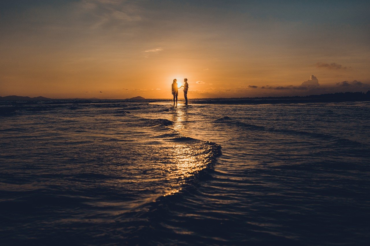 beach, couple, sunset-7087722.jpg